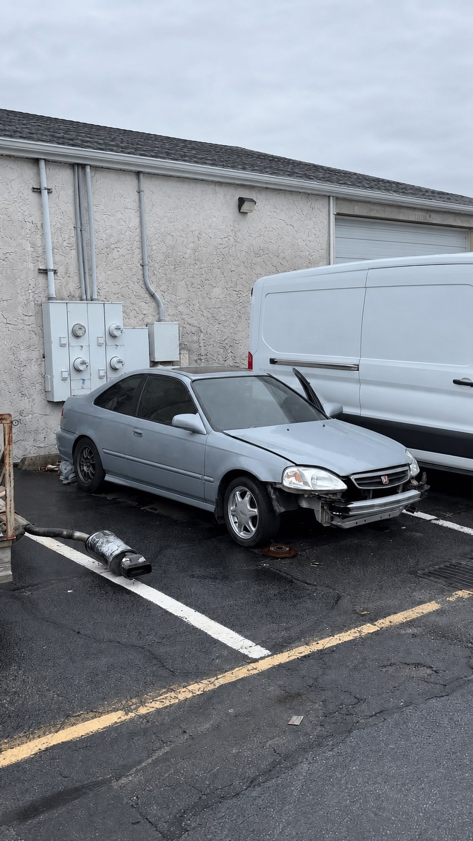 Silver Honda Civic project car outside the Mr. Honditas shop