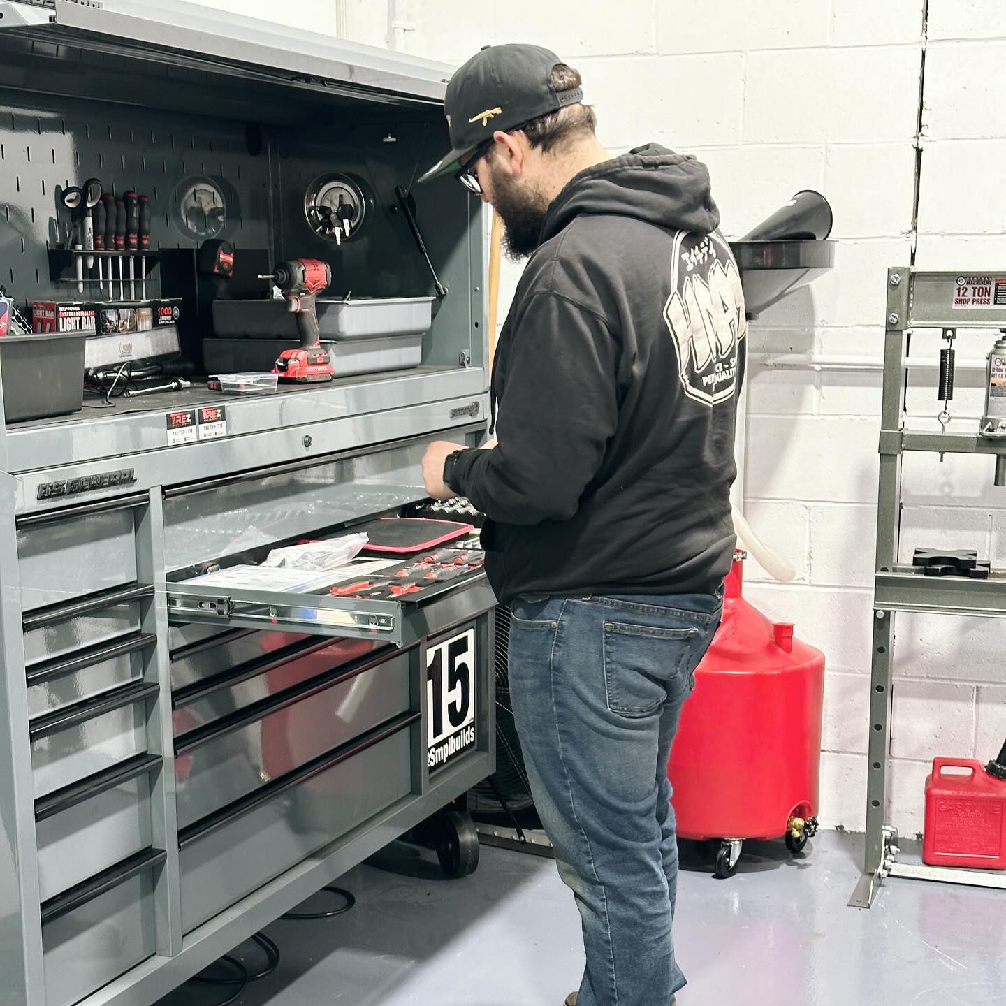Mr. Honditas technician preparing tools in the Toms River, NJ shop